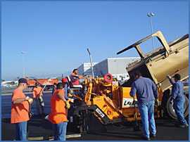people paving